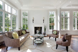 Sitting room with spacious windows and traditional furniture