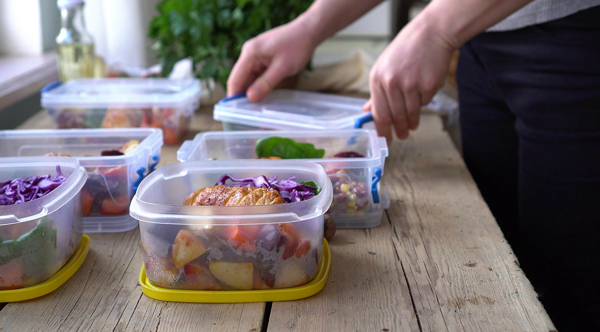kitchen remodel and addition in alexandria va 3 A homeowner packaging prepared meals for the week.