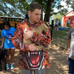 hhh holding goat crop